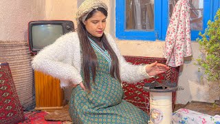 Cooking chicken liver over a fire |  village fire 