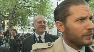 Tom Hardy Kicks Off With Reporter At The Dark Knight Rises Premiere London