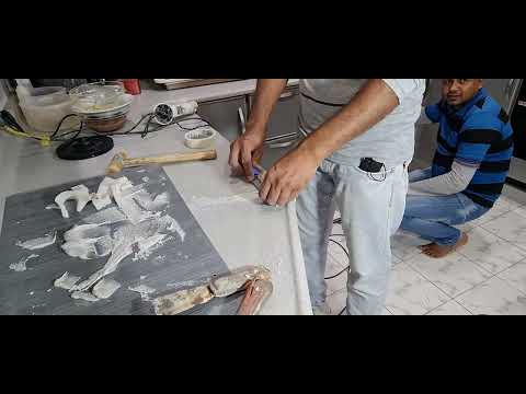 53 صيانة سطح رخام المطبخ