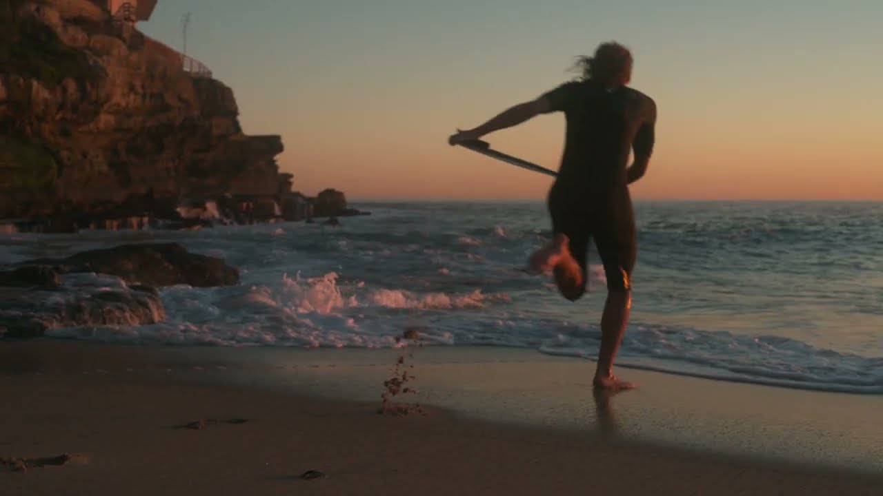 Skimboarding Perfect Conditions at Sunset
