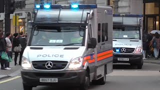Metropolitan Police Public Order Vans responding with lots of bullhorn in London
