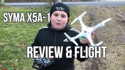 Syma X5A-1 Unboxing Review And Test Flight (MY FIRST RC REVIEW)