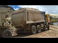 Iveco And Volvo Dump Trucks Climb Hills And On Muddy Roads