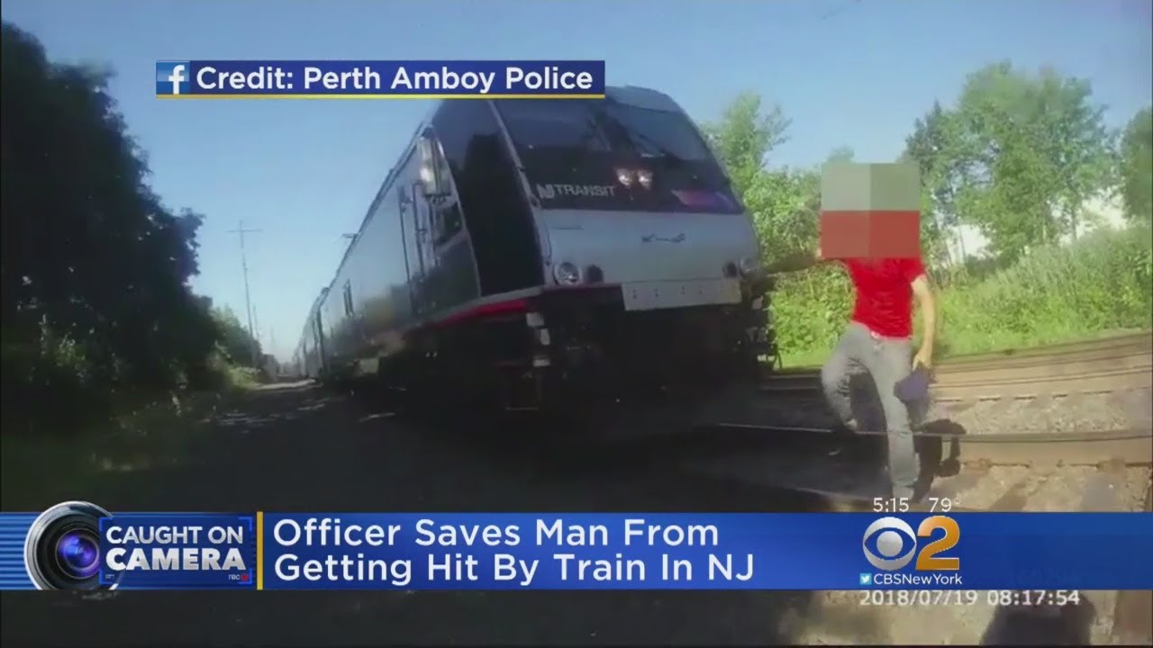 Watch: Officer Saves Man From Getting Hit By Train In NJ - YouTube