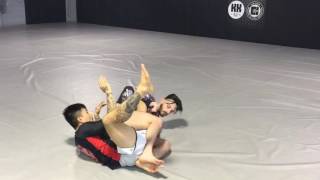 Kenny Kim shows Knee bar defense to straight ankle lock