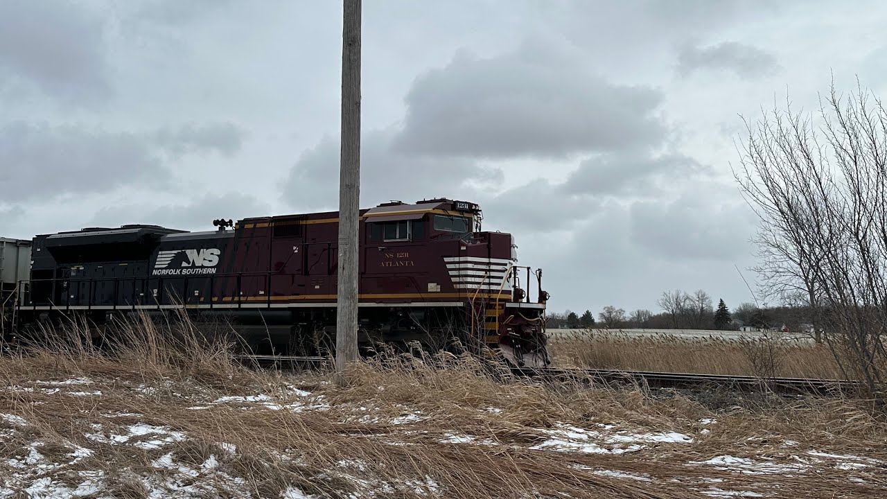 Westbound NS Manifest 13Q  meets with eastbound NS intermodal 256 with a very nice crew 