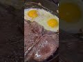 T-bone steak, eggs, n onions. ❤️👽🤘🤘