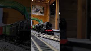 Bachmann 00 BR 9F hulls a goods train around the layout at night | #00gauge
