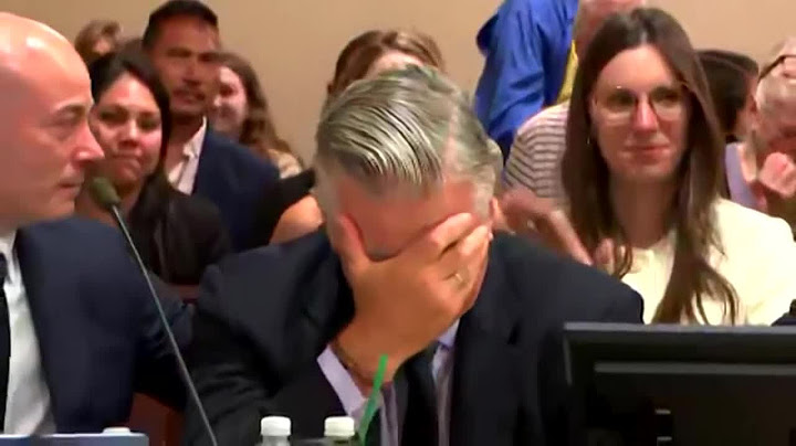 Alec Baldwin weeps in court as judge announces involuntary manslaughter case is dismissed midtrial
