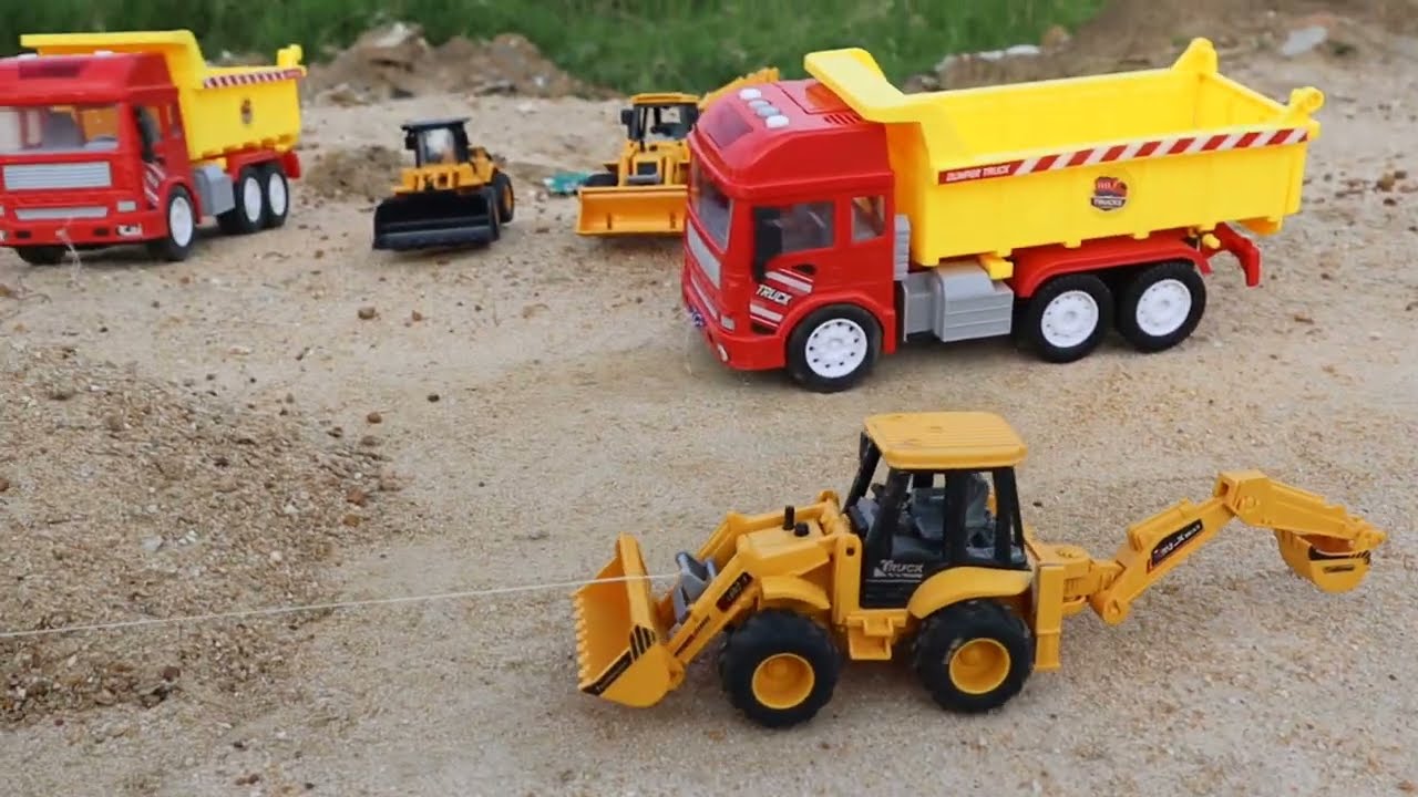 sand loading and unloading in ground 2truck 