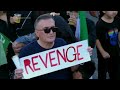 Thousands dressed in black surround the coffin of late Iran supreme Leader