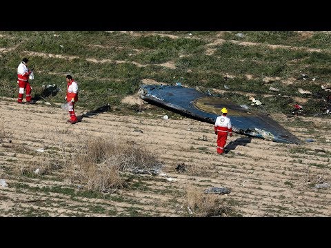 Iran denies shooting down plane, bulldozing crash site