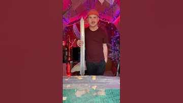 This cardboard great sword is ALMOST as tall as me.