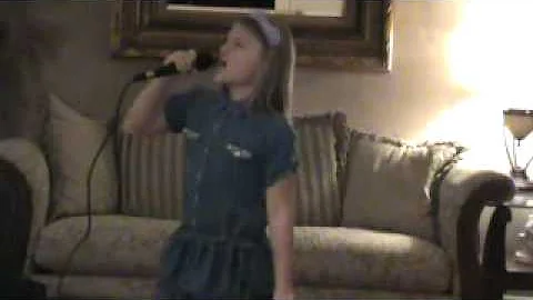 Camryn Maconaghy singing "Firework" by Katy Perry..