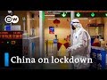 China puts millions under lockdown to contain Wuhan coronavirus | DW News