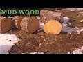 Splittin' Wood in the Mud-Yard