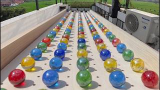 Marble Run 84 - The marble run under golden sunlight - glass marbles rolling down a long slope ASMR