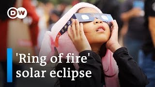 'Ring of fire' annular solar eclipse dazzles millions in Asia | DW News
