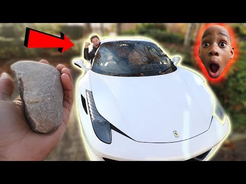 guy-throws-rock-at-a-ferrari!!-(dares)