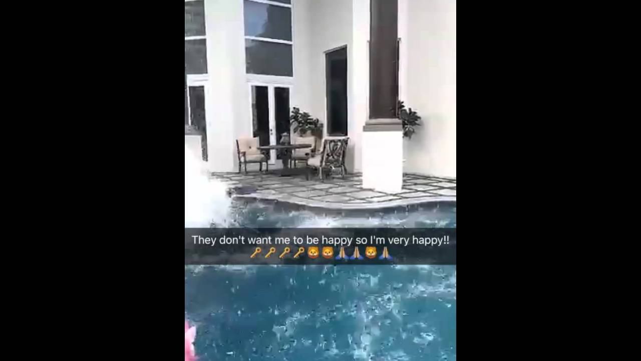 Dj Khaled jumps into a pool in slomo YouTube