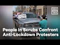 People in Scrubs Confront Anti-Lockdown Protesters | NowThis