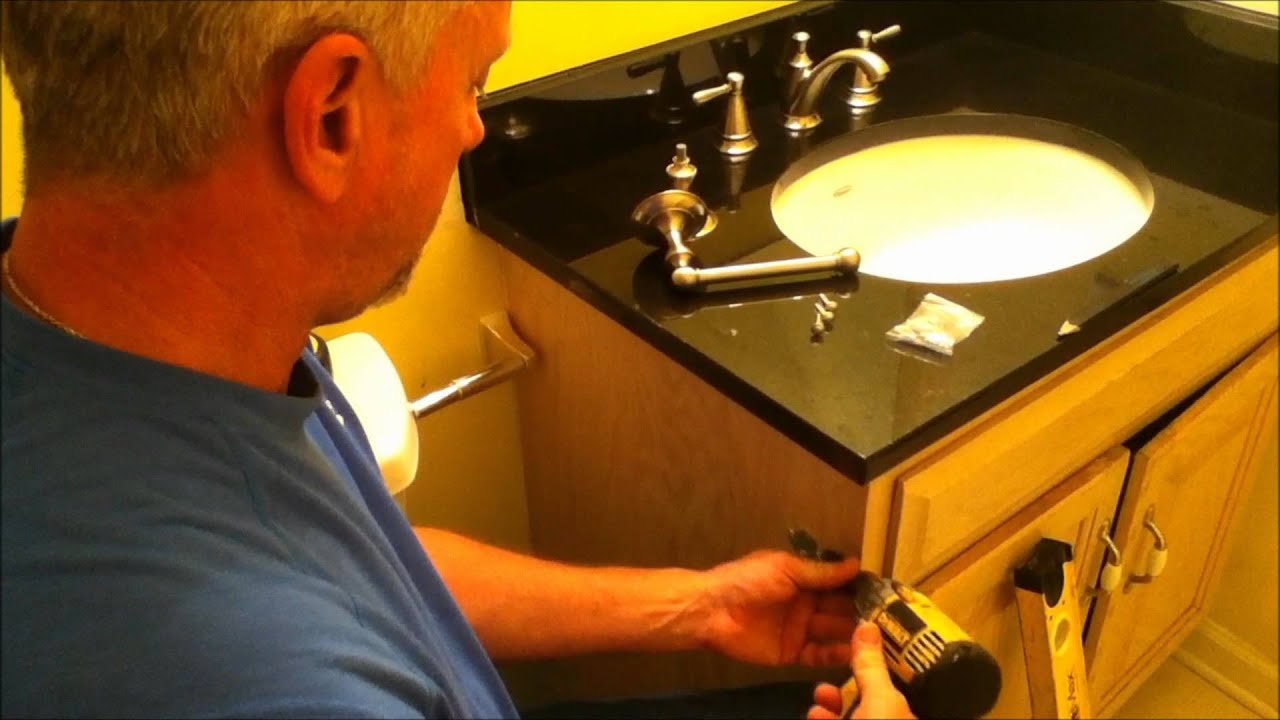 How to Install a Toilet Paper Holder in a Bathroom - Dengarden