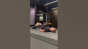 Foam roller hamstring bridge
