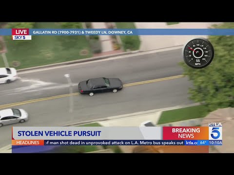 Occupants of suspected stolen car try to run across 5 Fwy after pursuit