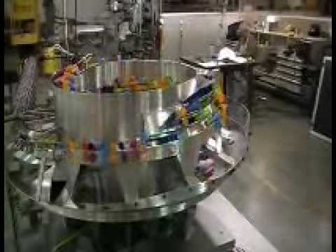 FORTVILLE FEEDERS, INC. Vibratory Feed System for Tubes