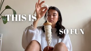 making yarn on a drop spindle // spinning vlog