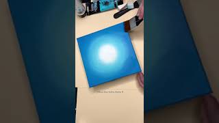Blending a background for a dot mandala painting.