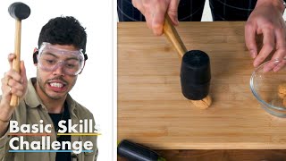 50 People Try to Crack a Walnut | Epicurious