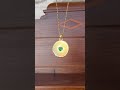 Video: Gold Pendant with Trillion-Cut Emerald