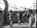 French sailors practicing the salute with cutlasses