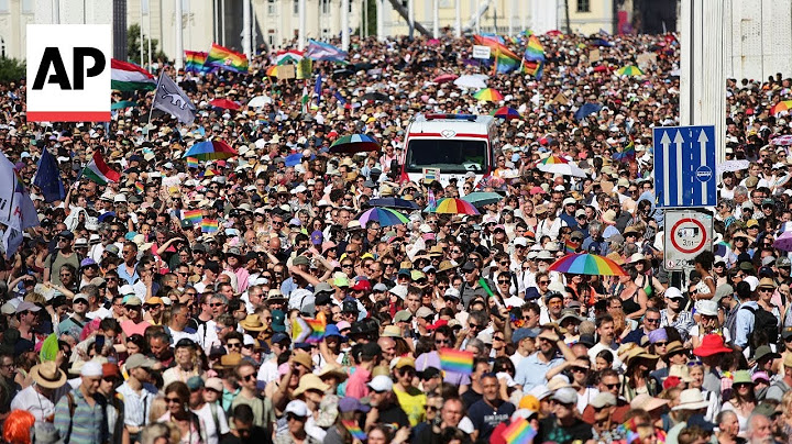 Around 100,000 march in Budapest Pride in open defiance of Hungary’s ban