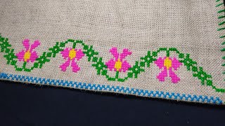 আসনের চারপাশের লতার নকশা। cross stitch border design. hand embroidery on jute mat.