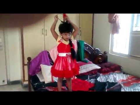 funny-videos-for-kids---baby-dance-video-watching-herself-in-the-mirror-with-long-hair-wig