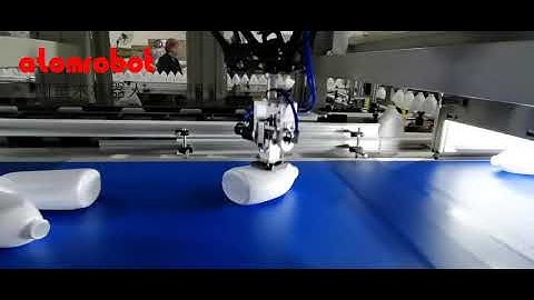 Delta robot from Atomrobot applied on detergent production line as bottle unscrambler.