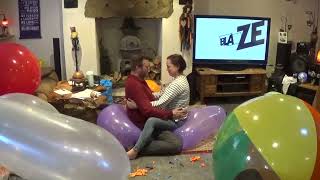 balloon popping couple