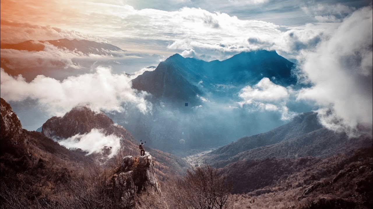 Горы в облаках. Над гор. Гималаи на закате. Тучи в горах. Горы аппалачи природа.