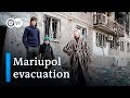 Evacuated Mariupol resident: 'In my yard, there are graves now' | DW News