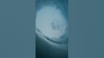 A camera falling through a hole in ice, down to the dark ocean below in Antarctica!