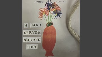 A Hand Carved Garden Tool
