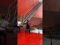 Techniques for climbing a ship's ladder when hit by strong waves #shorts