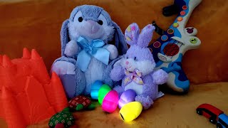 Watch short and cool video with Easter bunnies and colorful eggs