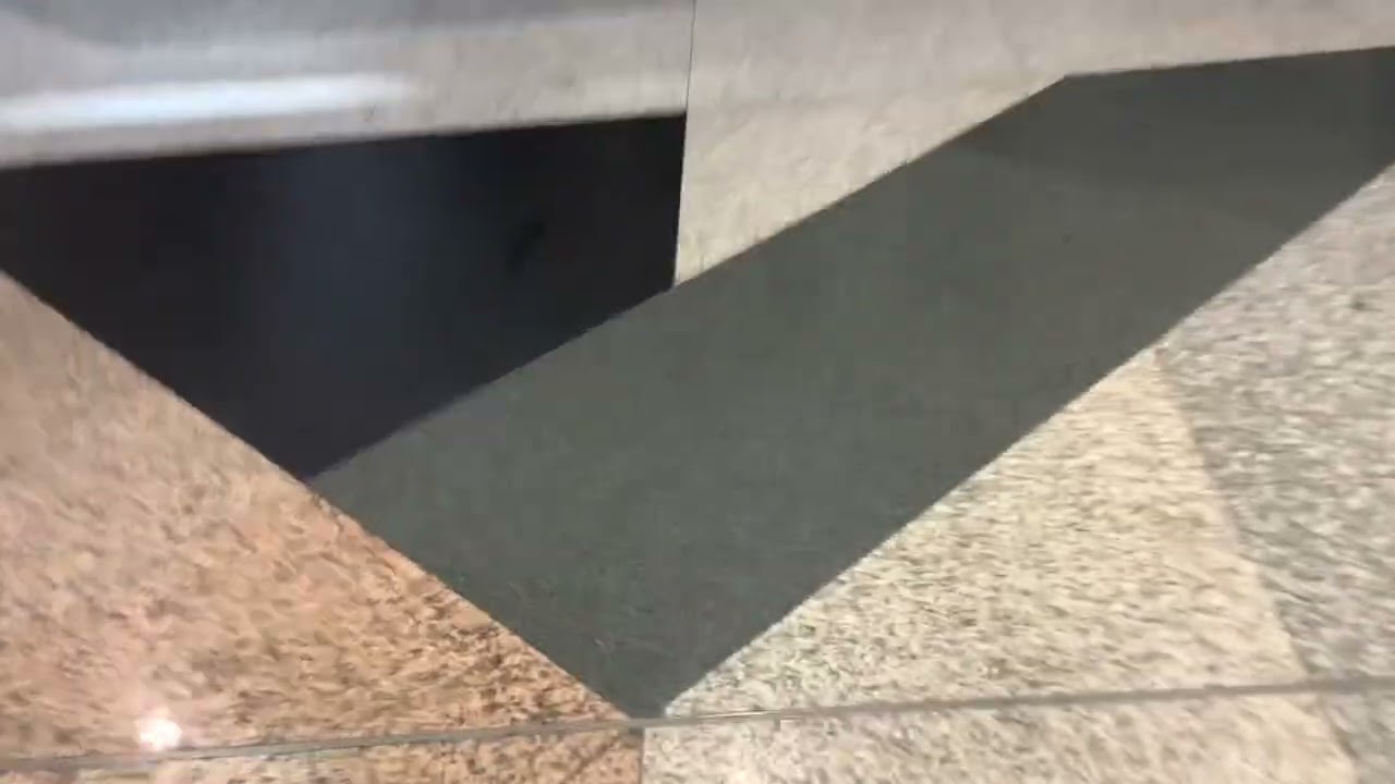 Kuala lumpur international airport terminal 1 escalator 