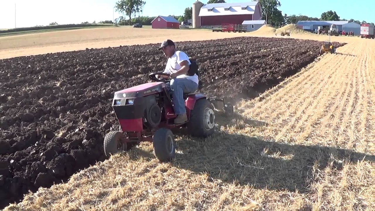 Stertz Farm Day XV: Wheel Horse 314-8 plowing with "The Punisher" - YouTube