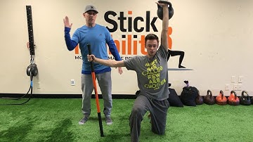 Half Kneeling Strict Shoulder Press  - Stick Mobility Exercise