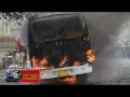 A bus burnt by Public