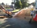 Backhoe  break 6" water main!